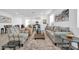 Spacious living room with a sofa, accent chairs, and a stylish coffee table at 16593 W Alameda Rd, Surprise, AZ 85387
