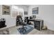 Functional home office with a spacious desk, storage cabinets, and a comfortable ergonomic chair at 16593 W Alameda Rd, Surprise, AZ 85387
