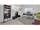 Well-equipped home office with a modern desk, comfortable chair, and ample natural light at 16593 W Alameda Rd, Surprise, AZ 85387