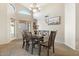Inviting dining room featuring large windows and a chandelier, perfect for gatherings at 16648 W Adams St, Goodyear, AZ 85338