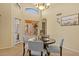 Cozy dining area with comfortable seating, natural light, and views of the backyard at 16648 W Adams St, Goodyear, AZ 85338