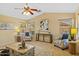 Spacious living room with vaulted ceiling, ample natural light, and stylish decor at 16648 W Adams St, Goodyear, AZ 85338
