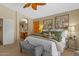 Bright main bedroom features neutral walls, carpet and an archway to the bathroom at 16648 W Adams St, Goodyear, AZ 85338