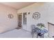 Lovely condo balcony with a table, chairs, and unique decor at 17017 N 12Th St # 2117, Phoenix, AZ 85022
