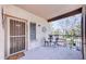 Comfortable condo balcony with a table, chairs, and a view of the community at 17017 N 12Th St # 2117, Phoenix, AZ 85022