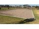 Community sand volleyball court ready for some fun in the sun at 17677 W Odeum Ln, Goodyear, AZ 85338