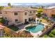 Aerial view of a beautiful home with a pool, outdoor kitchen, putting green and spacious backyard at 18330 W Woodrow Ln, Surprise, AZ 85388