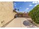 Backyard with stucco wall, concrete area and desert landscaping at 18330 W Woodrow Ln, Surprise, AZ 85388