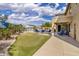 Outdoor space boasts a putting green, pool and spacious patio at 18330 W Woodrow Ln, Surprise, AZ 85388