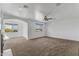 Bonus room features carpet, recessed lighting, and dual windows with neighborhood views at 18330 W Woodrow Ln, Surprise, AZ 85388
