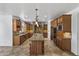 Modern kitchen featuring custom cabinets, stainless steel appliances, and granite countertops at 18330 W Woodrow Ln, Surprise, AZ 85388