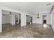 Spacious living room featuring tile floors and an open layout, perfect for gatherings and relaxation at 18330 W Woodrow Ln, Surprise, AZ 85388