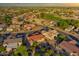 Beautiful aerial scene showcasing lush landscaping, tiled roofs, and the nearby golf course at 19472 N Marble Canyon Ct, Surprise, AZ 85374
