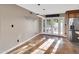 Dining room with tile flooring and view of the private backyard through french doors at 19604 N 13Th Ave, Phoenix, AZ 85027
