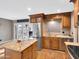 Kitchen with stainless appliances, granite countertops, and a view to the backyard at 19604 N 13Th Ave, Phoenix, AZ 85027