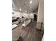 Spacious kitchen featuring an island, modern appliances, and lots of natural light from the windows at 2249 E Pinto Dr, Gilbert, AZ 85296