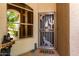 Inviting entryway with custom security door, desert-themed decor, and a welcoming aesthetic at 23813 S Pleasant Way, Sun Lakes, AZ 85248