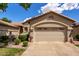 Charming single-Gathering home featuring a beige exterior, desert landscaping and a two-car garage at 23813 S Pleasant Way, Sun Lakes, AZ 85248