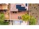 This aerial view showcases a home with a pool, patio and desert landscaping in the backyard at 25540 N 103Rd Dr, Peoria, AZ 85383