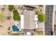 Aerial view of home with pool, artificial lawn and desert landscaping at 25845 N 44Th Ave, Phoenix, AZ 85083