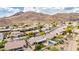 Mountain view of house with pool and artificial lawn at 25845 N 44Th Ave, Phoenix, AZ 85083