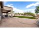 Expansive backyard featuring multiple seating areas, grass, and desert landscaping at 25845 N 44Th Ave, Phoenix, AZ 85083