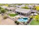 Aerial view of a backyard with a swimming pool, desert landscaping and small patio at 25845 N 44Th Ave, Phoenix, AZ 85083