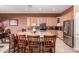 Kitchen featuring lots of light wood cabinets, stainless steel appliances and an island with seating at 25845 N 44Th Ave, Phoenix, AZ 85083