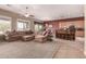 Spacious living room seamlessly connects to the kitchen creating an open and inviting space at 25845 N 44Th Ave, Phoenix, AZ 85083