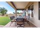 Covered patio with comfortable seating perfect for outdoor dining and entertaining at 25845 N 44Th Ave, Phoenix, AZ 85083