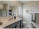 Clean bathroom featuring modern fixtures, walk-in shower, and neutral colors at 25946 W Cat Balue Dr, Buckeye, AZ 85396