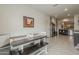 Open-concept dining room and kitchen area, with bench seating at 25946 W Cat Balue Dr, Buckeye, AZ 85396