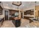 Spacious kitchen with custom cabinets, granite countertops, stainless steel appliances and large kitchen island at 26156 N 88Th Way, Scottsdale, AZ 85255