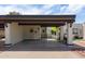 Attached covered carport with direct access to the front door and private outdoor space at 2938 S Country Club Way, Tempe, AZ 85282