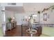 Open dining area with chandelier lighting and stylish decor, adjacent to the living room at 2938 S Country Club Way, Tempe, AZ 85282