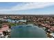 Expansive aerial view of a lakeside community with beautiful waterfront homes and lush green spaces at 3234 E Briarwood Ter, Phoenix, AZ 85048