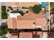 This aerial view highlights the property's terra cotta roof, pool, and mature landscaping at 3234 E Briarwood Ter, Phoenix, AZ 85048