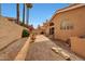 Expansive backyard with lush landscaping, a fountain, and a stone patio perfect for outdoor entertaining at 3234 E Briarwood Ter, Phoenix, AZ 85048