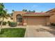 Charming single-story home featuring a well-manicured lawn, two car garage and desert landscaping at 3234 E Briarwood Ter, Phoenix, AZ 85048