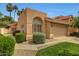 Inviting home with stucco exterior, tile roof, manicured landscaping, and attached two-car garage at 3234 E Briarwood Ter, Phoenix, AZ 85048