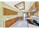 Well-maintained kitchen with stainless steel appliances, tile flooring, and plenty of counter space at 3234 E Briarwood Ter, Phoenix, AZ 85048