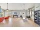 Bright living room with tile flooring, ceiling fans, shutters, and comfortable seating arrangement at 3234 E Briarwood Ter, Phoenix, AZ 85048