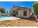 Back exterior view of the home and pool from the backyard at 3580 E Kesler Ln, Gilbert, AZ 85295
