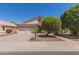 Charming home with a three-car garage and well-manicured front yard at 3580 E Kesler Ln, Gilbert, AZ 85295