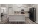 Bright kitchen with granite countertops, stainless steel appliances, and ample cabinet space at 3580 E Kesler Ln, Gilbert, AZ 85295