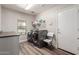 Bright laundry room with side-by-side washer and dryer and storage space at 3580 E Kesler Ln, Gilbert, AZ 85295
