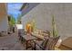 Beautiful outdoor patio with elegant furniture and desert landscaping at 3828 S Verbena Ave, Gilbert, AZ 85297