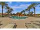 Beautiful community pool with ample seating and a cabana for relaxation at 3828 S Verbena Ave, Gilbert, AZ 85297