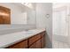 Bathroom featuring white countertop and a shower with a patterned curtain at 4106 W Mission Ln, Phoenix, AZ 85051