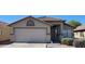Charming single-story home with a two-car garage and well-maintained desert landscaping at 419 W Harwell Rd, Phoenix, AZ 85041